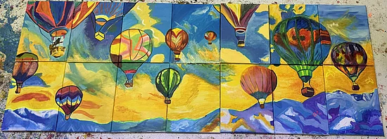 'The Sky is the Limit': A puzzle image showing hot air balloons on the sky. The picture is decided in 7 columns and two rows. The parts don't perfectly match.