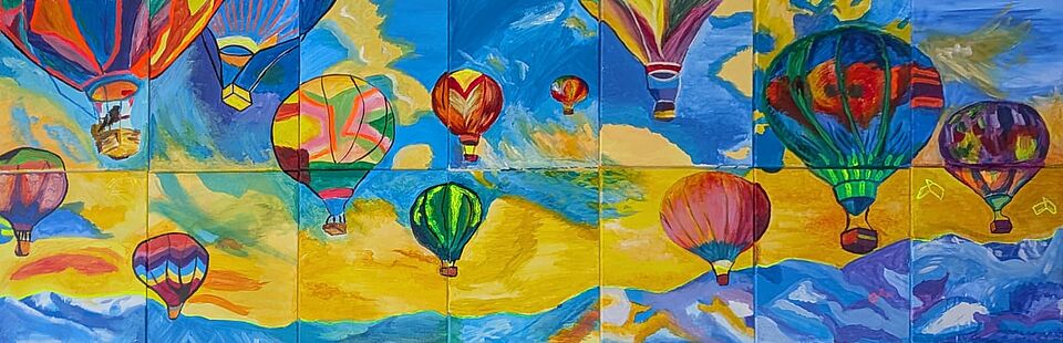 'The Sky is the Limit': A puzzle image showing hot air balloons on the sky. The picture is decided in 7 columns and two rows. The parts don't perfectly match.